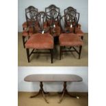 A 20th Century mahogany twin pedestal dining table; and eight dining chairs.