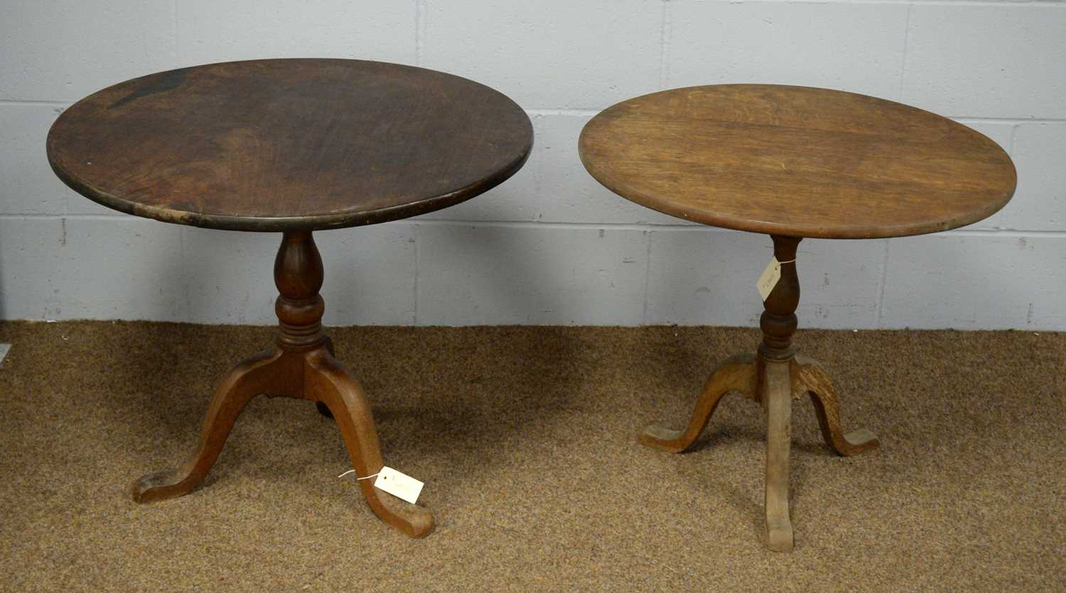 Two tripod tables.