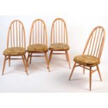 Ercol: a set of four light beech and elm 'Quaker Windsor' chairs.