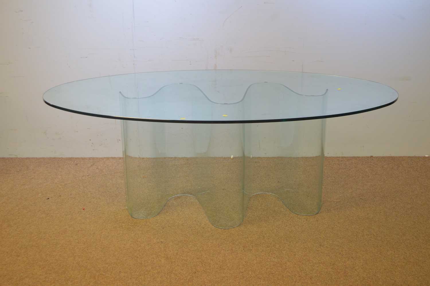 20th C glass oval glass dining table.