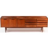 A mid Century teak sideboard in the 'Long Tom' style.