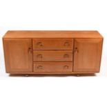 Ercol: an elm Model 455 sideboard.