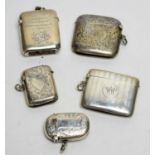 Five silver vesta cases,