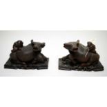 Pair of Chinese carved wood water buffalo figures