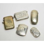 Five silver vesta cases,