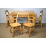 Victorian-style pine dining table; and four balloon back kitchen chairs.