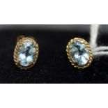 Two pairs of light blue topaz earrings,