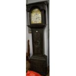 Georgian carved oak longcase clock.