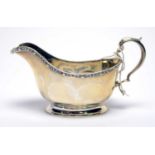 A silver sauce boat,