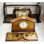 Two book stands and two mantel clocks