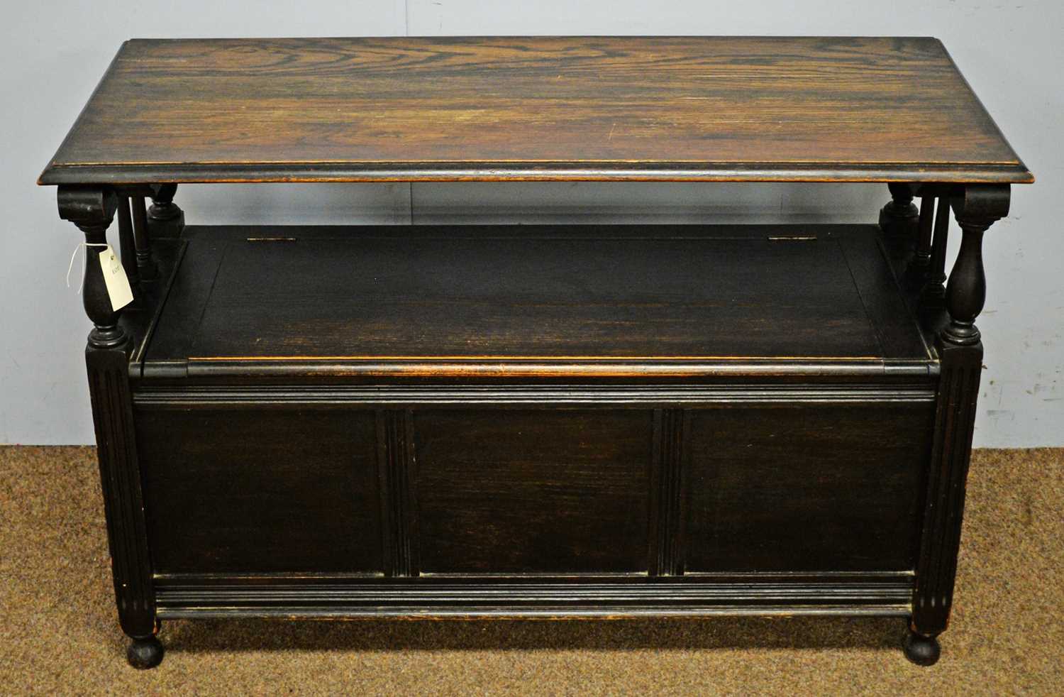 Mid 20th C stained oak monk's bench.