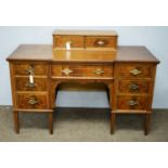 An inlaid mahogany breakfront dressing table base.