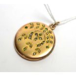An early 20th Century yellow metal pendant,
