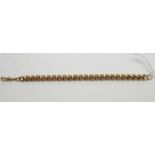 A 9ct yellow gold circular and oval link chain bracelet,