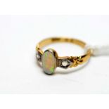 An opal and diamond ring,