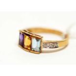 An amethyst, citrine, topaz and diamond ring,