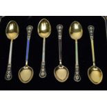 A set of six silver gilt and enamel coffee spoons