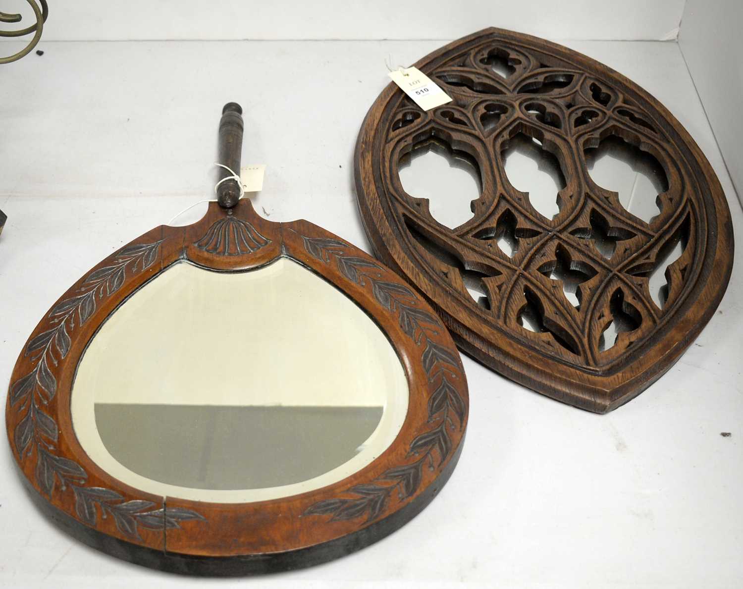 Two carved wood wall mirrors