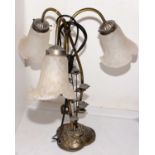 A 20th Century three-branch gilt metal table lamp.