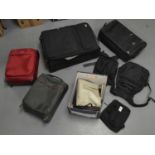 Samsonite cabin cases, large case; and various handbags and purses.