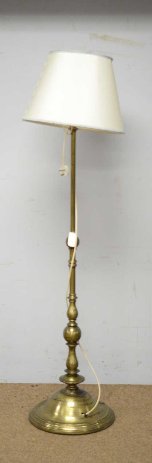 An Indian style gold painted metal lamp standard.