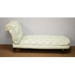 A Victorian-style button upholstered drop-end chaise longue.