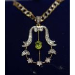 A peridot and diamond set Edwardian style pendant,