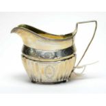 A George III silver milk jug