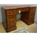 Victorian walnut breakfront pedestal writing desk.