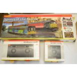 Boxed Hornby 00-gauge electric train set, and two power controllers.