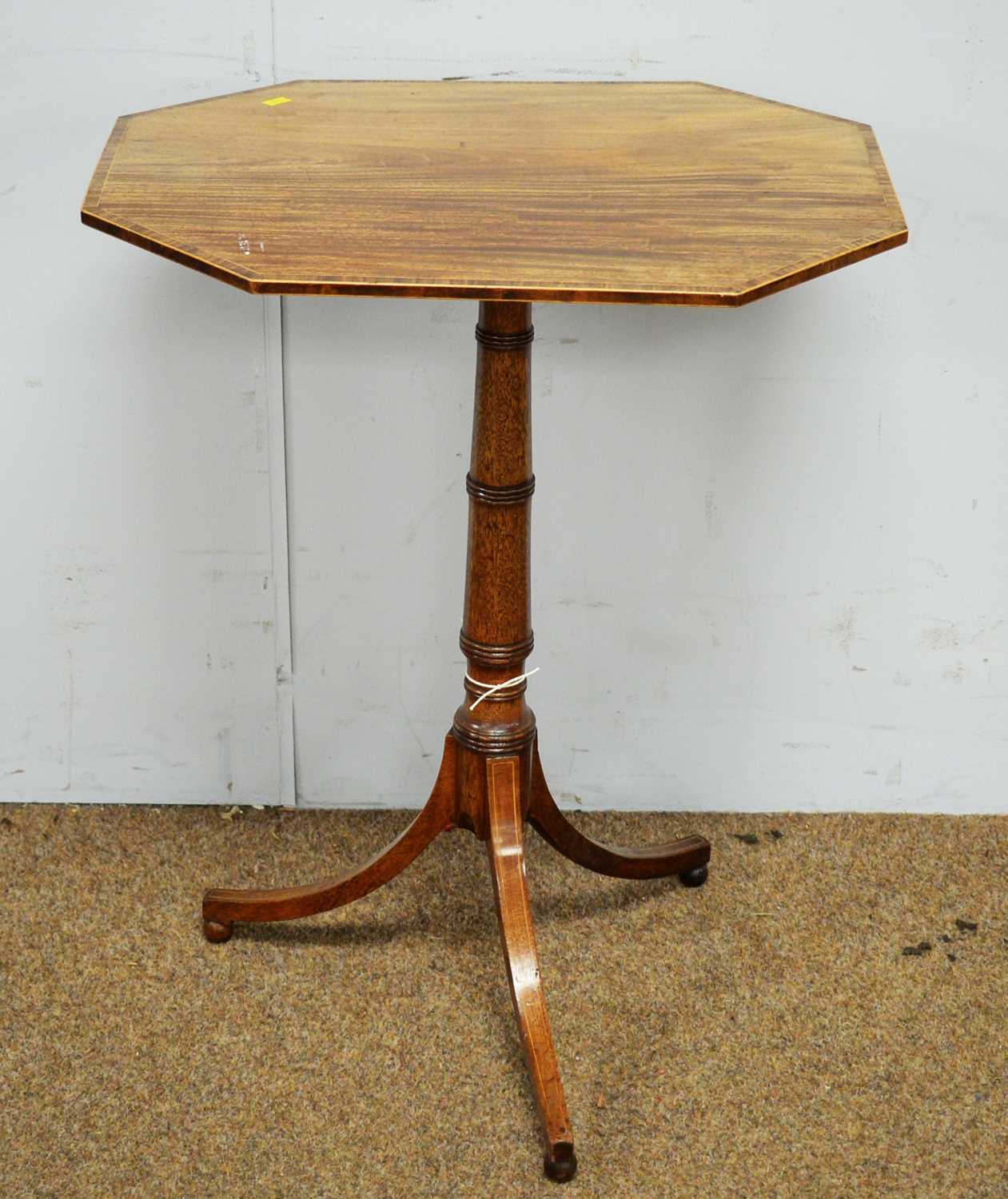 A 19th Century mahogany and banded tripod table.