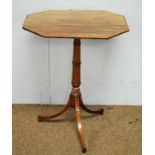 A 19th Century mahogany and banded tripod table.