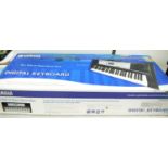 A boxed Yamaha Digital Keyboard YPT-200