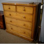 A Victorian ash chest of two short and three long drawers.