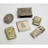 An Oriental white metal matchbox case, and other items