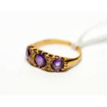 An amethyst and diamond ring,