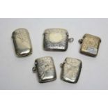 Five silver vesta cases,