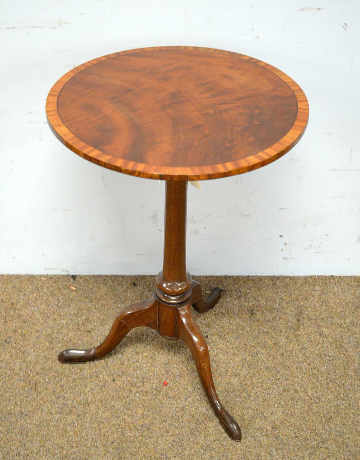 Mahogany and satinwood banded tripod table.