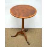 Mahogany and satinwood banded tripod table.