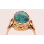 An opal triplet and yellow-metal dress ring.