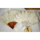 Two Victorian feather hand fans and a fan leaf.