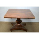 A Victorian mahogany rectangular tilt-action dining table.