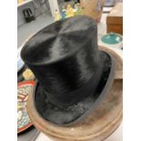 Silk top hat, in leather hat box.