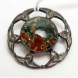 A Scottish "Iona" moss agate and silver brooch.