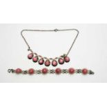 A Danish pink moonstone and white metal necklace by Hermann Siersbol.