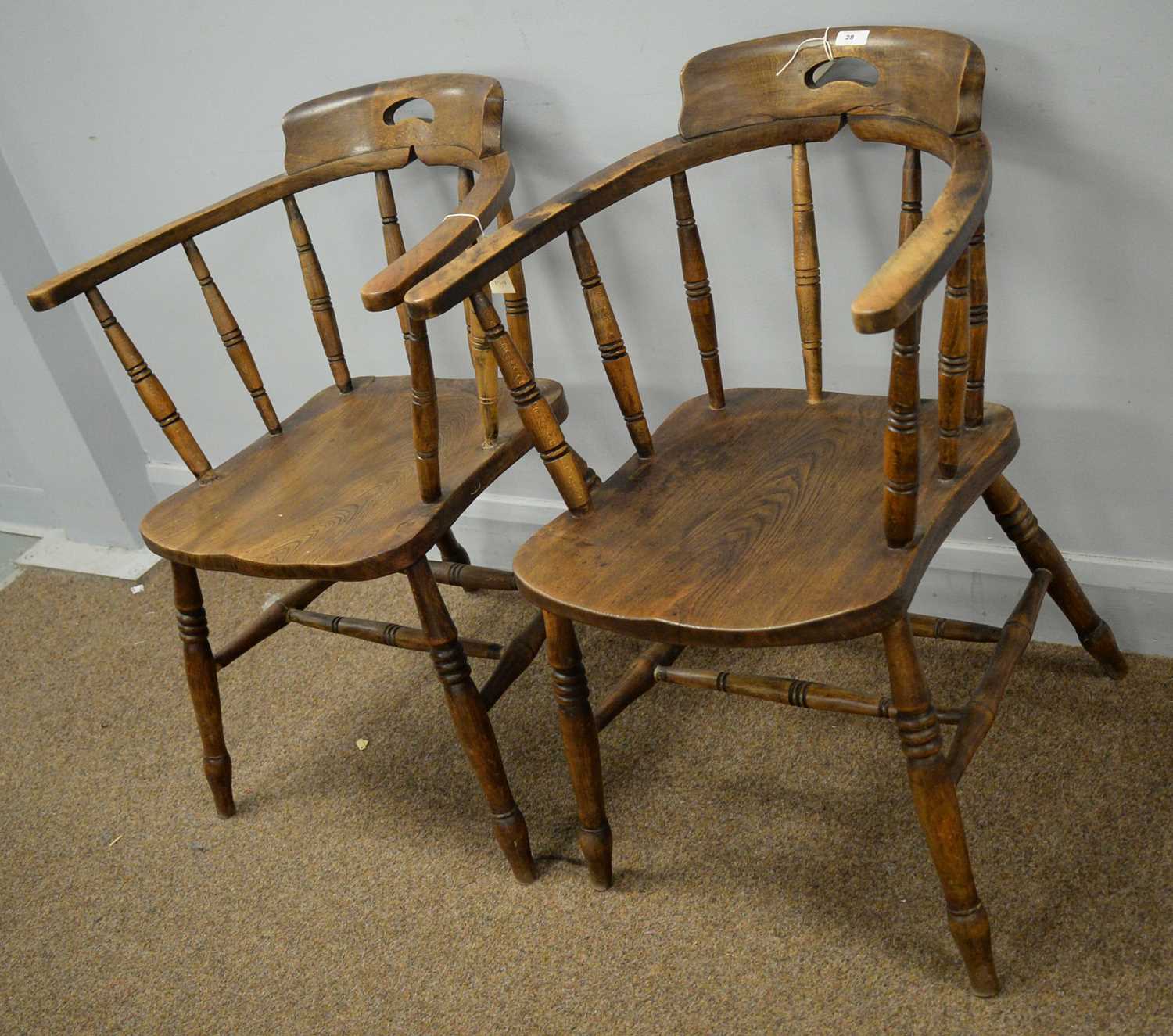 Two captain's chairs