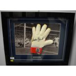 A goalkeepers glove signed by Gordon Banks