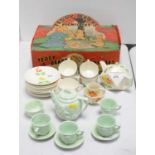 A Teddy Bears picnic tea set, and another