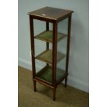 An Edwardian mahogany and satinwood banded four-glass centre display cabinet