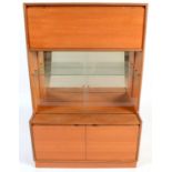 Turnidge of London Ltd: a mid Century teak mirror-backed display cabinet.